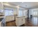 Large kitchen features an island with seating and stainless steel appliances at 1311 N Congress Dr, Chandler, AZ 85226