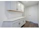 Functional mudroom featuring white cabinetry and drawers at 1311 N Congress Dr, Chandler, AZ 85226