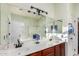 Bright bathroom with double sinks, updated fixtures, large mirror and ample counter space at 1312 W Bartlett Way, Chandler, AZ 85248