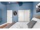 Spacious bedroom featuring a closet and a mirror on the wall at 1312 W Bartlett Way, Chandler, AZ 85248
