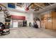 Spacious garage with ample storage cabinets, organizational racks, and a clean, uncluttered floor at 1312 W Bartlett Way, Chandler, AZ 85248