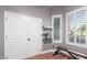 Office featuring a desk, shelves, a bench, and natural light at 1312 W Bartlett Way, Chandler, AZ 85248