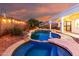 Backyard pool featuring an attached hot tub, and covered patio at 1312 W Bartlett Way, Chandler, AZ 85248