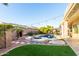 Backyard featuring a beautiful pool and spa with lush landscaping at 1312 W Bartlett Way, Chandler, AZ 85248
