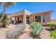 View of the backyard patio with desert landscaping and covered seating area at 14806 E Lookout Ledge --, Fountain Hills, AZ 85268