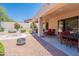Backyard with hot tub, covered patio, desert landscaping, and seating at 14806 E Lookout Ledge --, Fountain Hills, AZ 85268