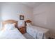 Bright bedroom with two beds and a closet, offering a clean and simple design at 14806 E Lookout Ledge --, Fountain Hills, AZ 85268