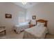 Well-lit bedroom with two twin beds, side table, and a cozy atmosphere at 14806 E Lookout Ledge --, Fountain Hills, AZ 85268