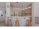 Bright kitchen with barstool seating at the breakfast bar, recessed lighting, and ample cabinet space at 14806 E Lookout Ledge --, Fountain Hills, AZ 85268