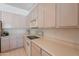 Bright kitchen with tile flooring, ample cabinet space, modern appliances, and neutral countertops at 14806 E Lookout Ledge --, Fountain Hills, AZ 85268