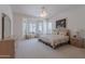Serene main bedroom with sitting area, large windows, and neutral decor for a relaxing retreat at 14806 E Lookout Ledge --, Fountain Hills, AZ 85268