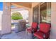 Covered patio with a stainless steel grill and comfortable seating area at 14806 E Lookout Ledge --, Fountain Hills, AZ 85268