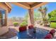 Charming covered patio with comfortable seating and a view of the desert landscape at 14806 E Lookout Ledge --, Fountain Hills, AZ 85268