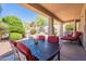 Inviting covered patio with outdoor dining and lounge areas, perfect for relaxation at 14806 E Lookout Ledge --, Fountain Hills, AZ 85268