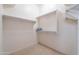 Bright walk-in closet with ample shelving and hanging space for organized storage at 14806 E Lookout Ledge --, Fountain Hills, AZ 85268