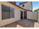 Private patio area with tile flooring and stucco walls at 15435 N 28Th St # 3, Phoenix, AZ 85032