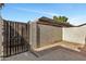 Private, enclosed backyard with secure metal gate and patio at 15435 N 28Th St # 3, Phoenix, AZ 85032