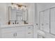 Modern bathroom with updated vanity, stylish mirror, and shower at 15435 N 28Th St # 3, Phoenix, AZ 85032