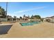 Clean, inviting community swimming pool with ample deck space for lounging at 15435 N 28Th St # 3, Phoenix, AZ 85032