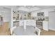 Bright, updated kitchen featuring stainless steel appliances, modern cabinets, and an adjacent dining area at 15435 N 28Th St # 3, Phoenix, AZ 85032