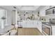 Bright, modern kitchen with sleek white cabinets, stainless steel appliances, and an open layout at 15435 N 28Th St # 3, Phoenix, AZ 85032