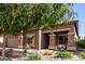 Charming two-story home with a large driveway, desert landscaping, and stone accents on the facade at 17753 W Columbine Dr, Surprise, AZ 85388