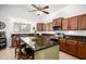 Spacious kitchen featuring a large island, stainless steel appliances, and ample cabinet space at 17753 W Columbine Dr, Surprise, AZ 85388