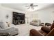 Spacious living room with a large entertainment center and comfortable seating arrangement at 17753 W Columbine Dr, Surprise, AZ 85388