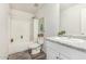Bright bathroom with tub-shower combination and stylish vanity at 198 E Patton Ave, Coolidge, AZ 85128