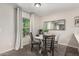 Cozy dining area with a modern table and decorative accents at 198 E Patton Ave, Coolidge, AZ 85128