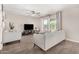 Open concept living room with modern furniture and plenty of natural light at 198 E Patton Ave, Coolidge, AZ 85128