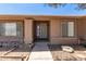 Close up of the front entrance, showing a security door and rock landscaping at 2031 W Gila Ln, Chandler, AZ 85224