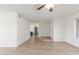 Spacious living room showcasing tile flooring and neutral paint, awaiting your personal touch at 2031 W Gila Ln, Chandler, AZ 85224