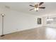Bright living room with tile flooring, neutral walls, and natural light, ready for customization at 2031 W Gila Ln, Chandler, AZ 85224