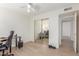 Bright office space featuring mirrored closets and a view to the rest of the house at 2031 W Gila Ln, Chandler, AZ 85224