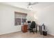 Home office space with a desk, chair, and large window for natural light at 2031 W Gila Ln, Chandler, AZ 85224