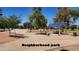 A neighborhood park with playground, picnic shelter and mature landscaping at 2031 W Gila Ln, Chandler, AZ 85224