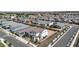Aerial view of a well-planned community with modern homes and landscaped yards, highlighting the neighborhood layout at 21934 E Lords Ct, Queen Creek, AZ 85142