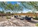 Charming backyard retreat featuring a seating area and brick pavers, perfect for relaxing or entertaining at 21934 E Lords Ct, Queen Creek, AZ 85142