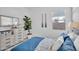 Bright bedroom with nautical decor, ample natural light, and neutral-toned dressers at 21934 E Lords Ct, Queen Creek, AZ 85142