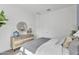 Well-lit bedroom featuring stylish decor, neutral furniture, and ample sunlight at 21934 E Lords Ct, Queen Creek, AZ 85142
