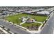 Aerial view of the community park featuring playgrounds and shaded seating areas, perfect for Gathering outings at 21934 E Lords Ct, Queen Creek, AZ 85142