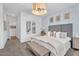 Relaxing bedroom with a cozy bed, soft lighting, and a serene atmosphere at 21934 E Lords Ct, Queen Creek, AZ 85142