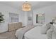 Calm bedroom features a plush bed, dresser, and soothing neutral tones at 21934 E Lords Ct, Queen Creek, AZ 85142