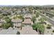 Neighborhood aerial view showcases well-maintained homes, mature trees, and convenient access to amenities at 21973 N 102Nd Ln # 411, Peoria, AZ 85383