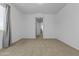 Bedroom with a large window and neutral walls, offering a versatile space at 21973 N 102Nd Ln # 411, Peoria, AZ 85383