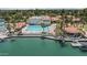 Scenic aerial view of community pool, waterfront amenities and surrounding lush landscaping at 2243 E Cortez Dr, Gilbert, AZ 85234