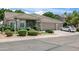 Charming single-story home featuring a tile roof, three-car garage, and manicured front yard at 2243 E Cortez Dr, Gilbert, AZ 85234