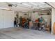 Spacious garage interior featuring lots of storage, and an array of organizational systems for tools and equipment at 2243 E Cortez Dr, Gilbert, AZ 85234