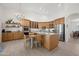 Bright, spacious kitchen featuring custom cabinets, stainless steel appliances, and a large center island at 2243 E Cortez Dr, Gilbert, AZ 85234